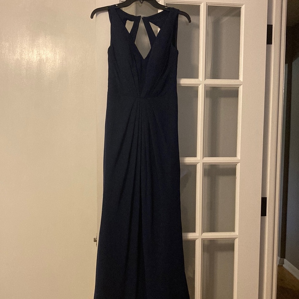 Size 4, hemmed for a ~ 5’ 2”female. Worn once.